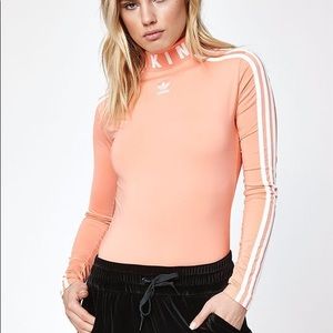 Adidas HU Hiking Peach Bodysuit Size L PACSUN